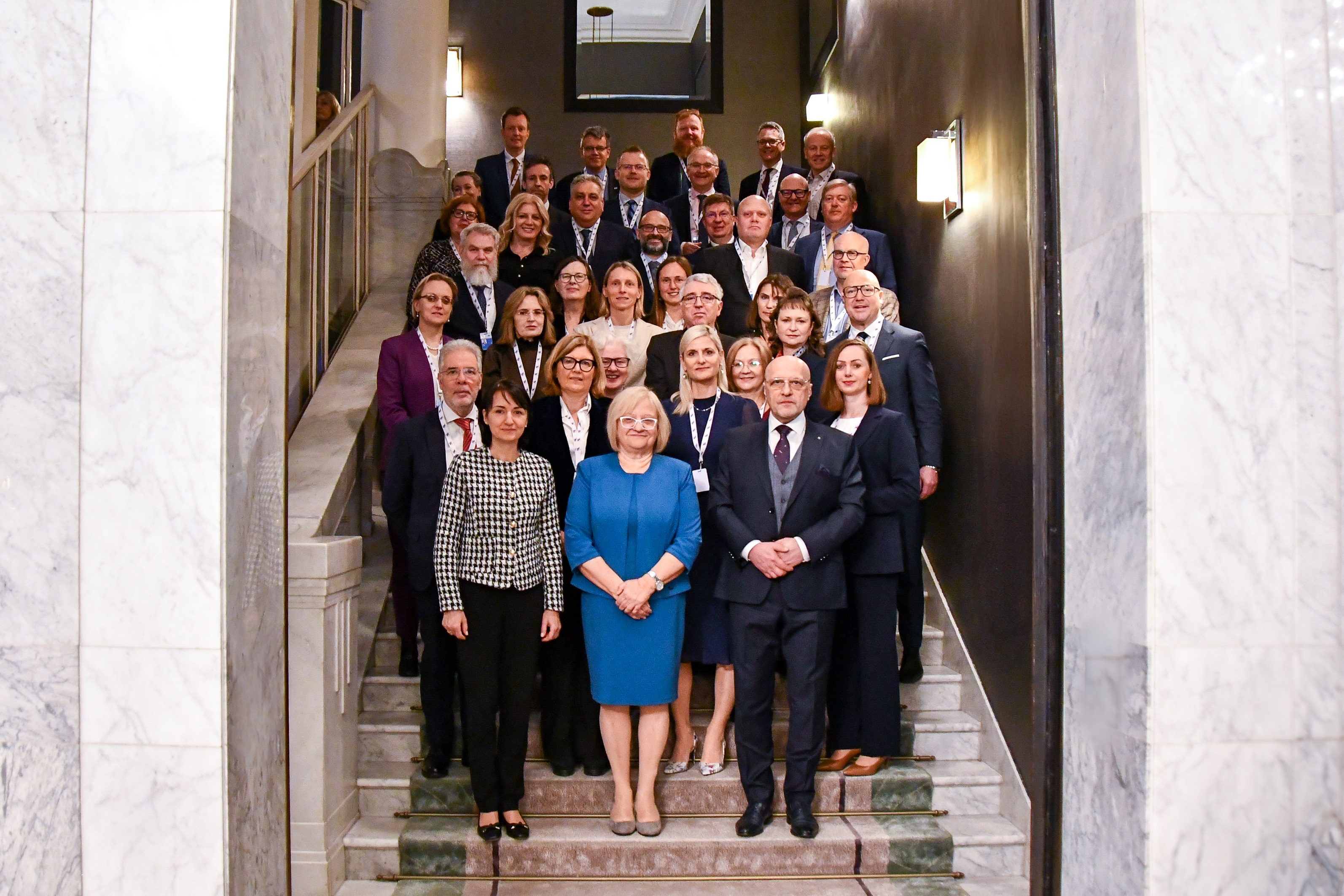 Zoom in  - The family photo shows all participants of the High level meeting