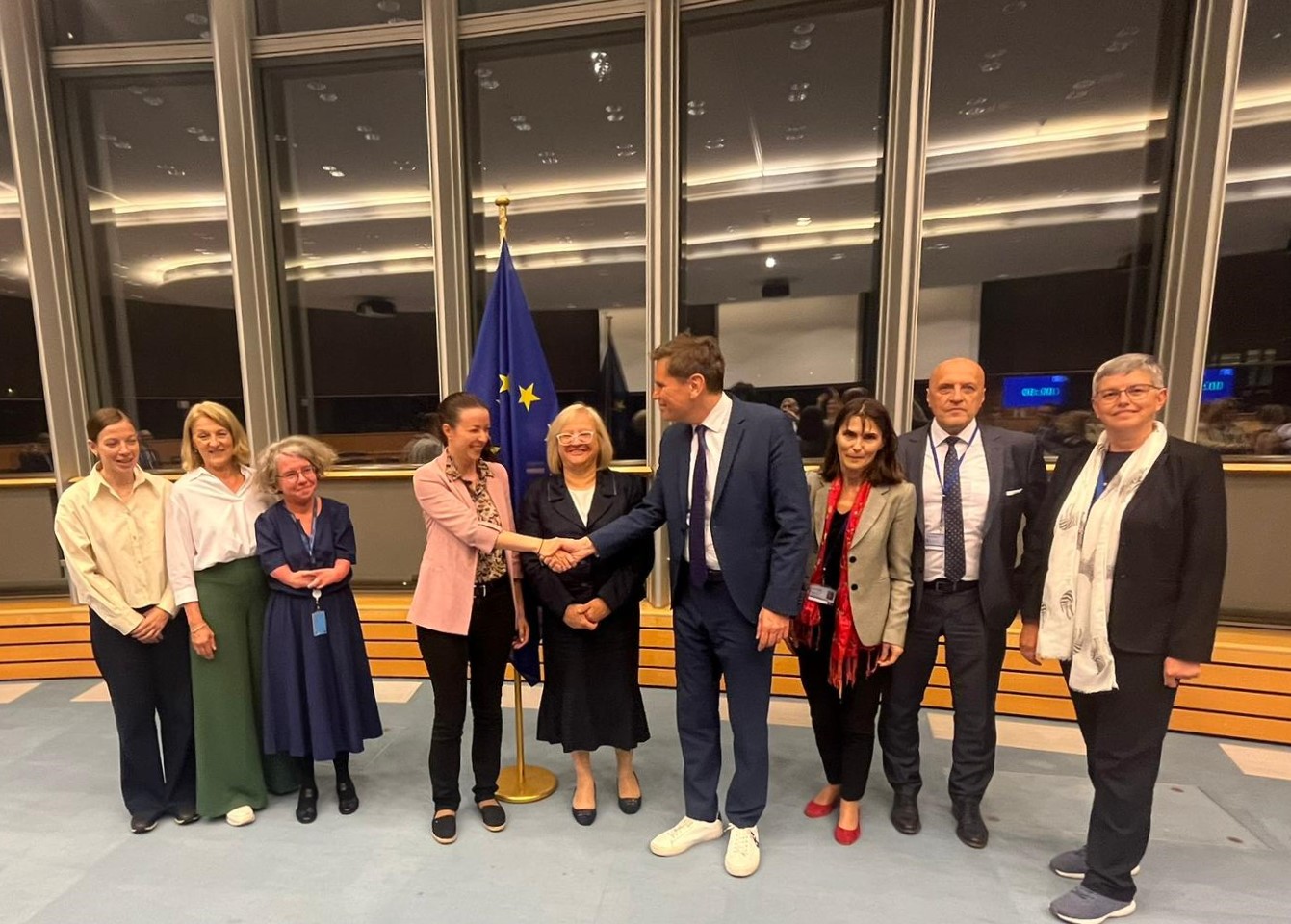 The photo shows the participants of the trilogue